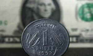 Rupee hits record low of Rs 8809 as US tariffs