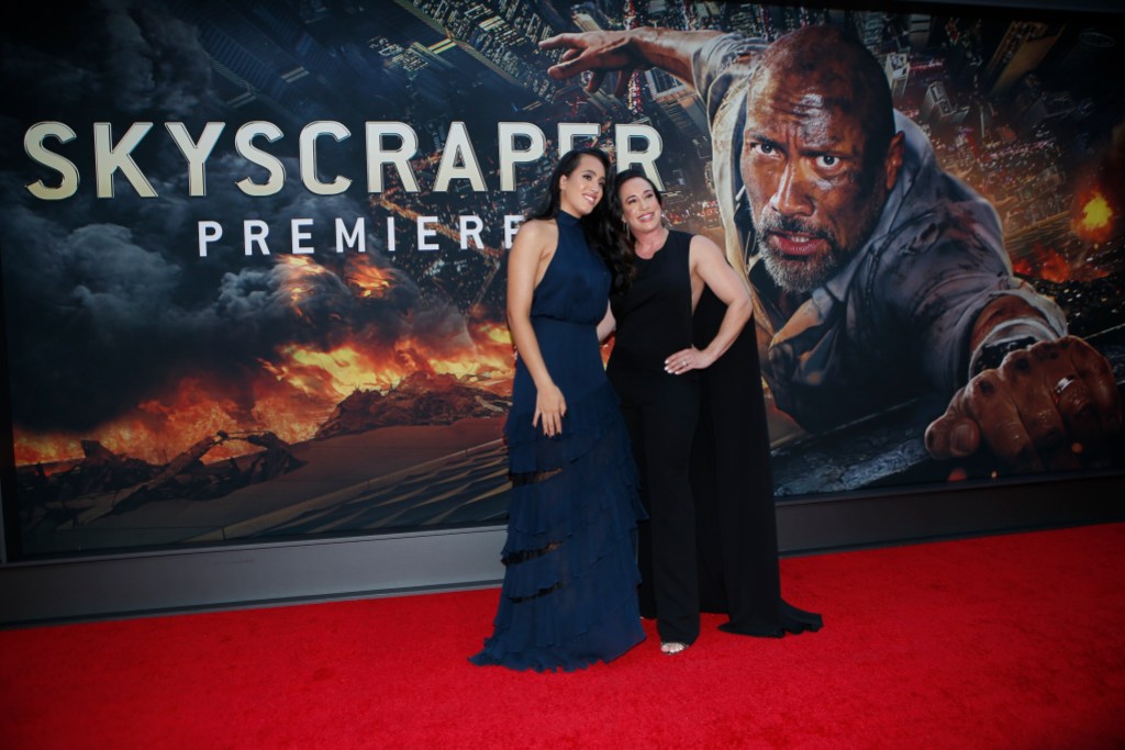 Simone Alexandra Johnson (L) and he rmother producer Dany Garcia attend the premiere of 'Skyscraper' on July 10, 2018 in New York City. (Photo by KENA BETANCUR / AFP)        (Photo credit should read KENA BETANCUR/AFP via Getty Images)