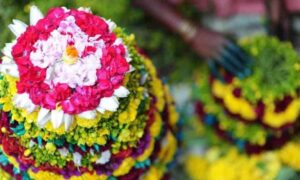 Bathukamma begins in Telangana Warangal hosts grand inaugural event
