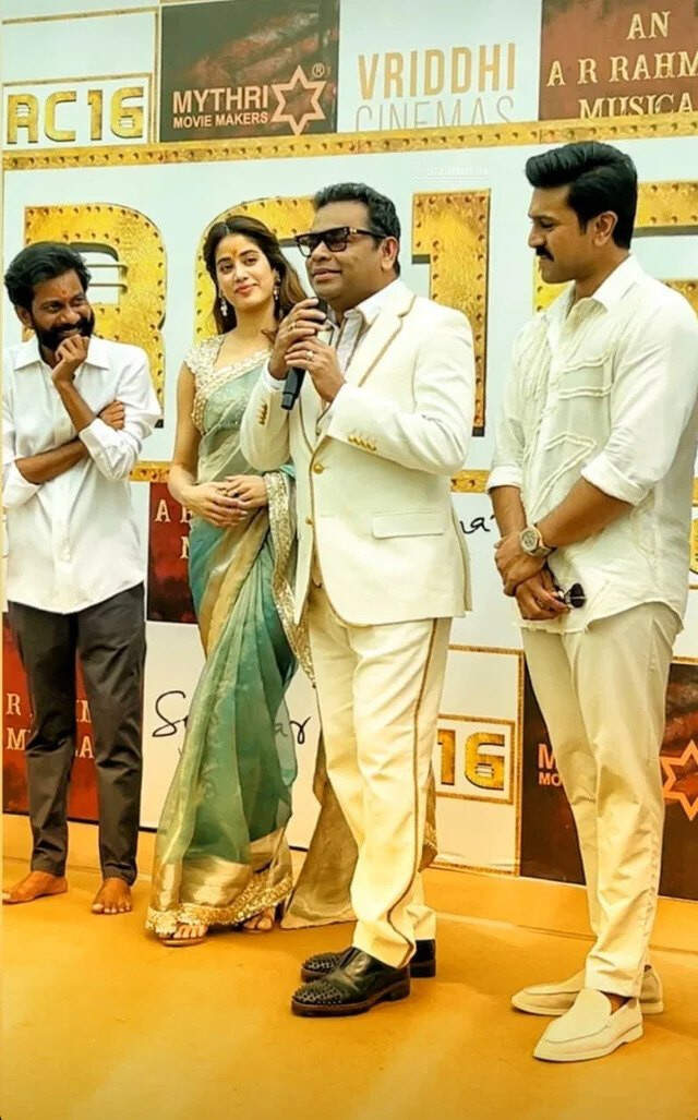 AR Rahman talks about Peddi during the film's launch. Ram Charan, Janhvi Kapoor and Buchi Babu Sana are also seen in the pict