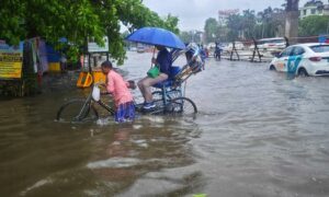 Heavy rains in Kolkata leave seven dead rupee sinks to