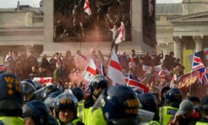 Protesters clash with police during far right rally against immigration 25