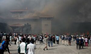 What sparked the violent protest in Nepal