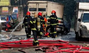 16 killed in fire at garment factory and chemical warehouse