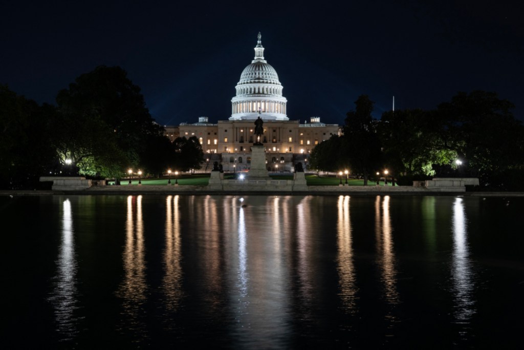 The US Capitol is seen lit up hours before a partial government shutdown is set to take effect in Washington, DC, on September 30, 2025. The US government barreled towards its first shutdown in six years Tuesday, with funding expiring at midnight after Democrats fought a war of words with Donald Trump and senators rejected a last-ditch bid to keep the lights on. (Photo by ANDREW CABALLERO-REYNOLDS / AFP)