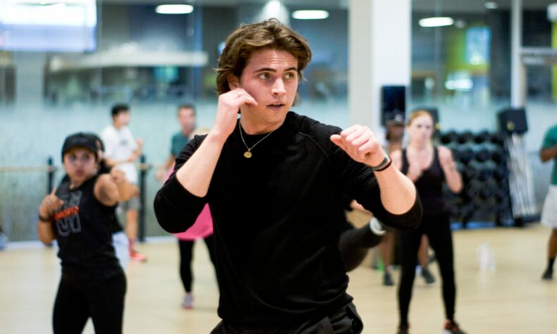 1761604401 Cobra Kais Tanner Buchanan Talks Fitness Regimen With Strong Nation