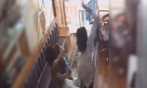 1762594055 Ahmedabad shopkeeper slaps woman 17 times for throwing chilli powder