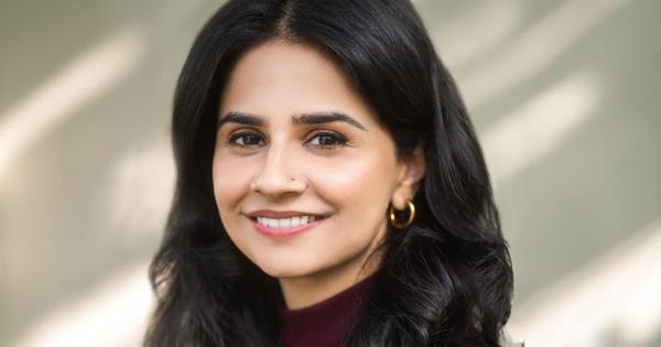 A father teaches his young son to shoot feral dogs