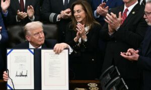 As Trump signs bill to end US government shutdown staffers