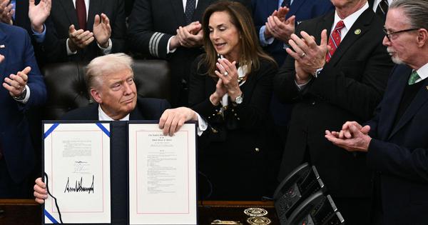 As Trump signs bill to end US government shutdown staffers