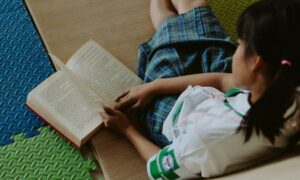 Why the tactile experience of books still matters in raising